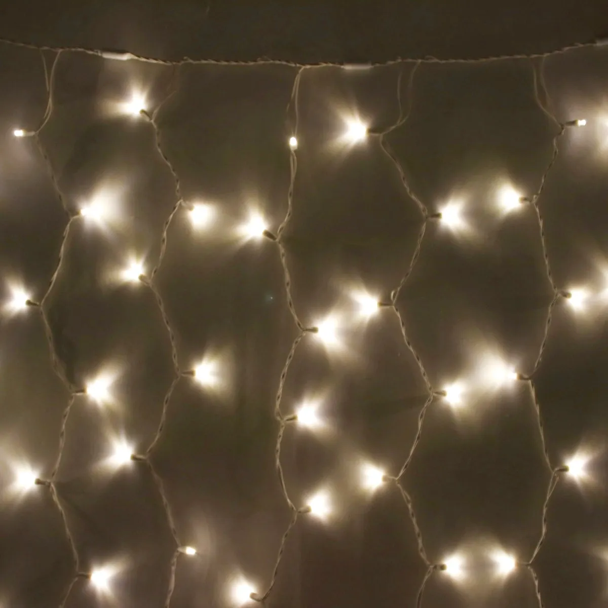 8-foot LED Curtain Icicle Lights Warm White on White Wire